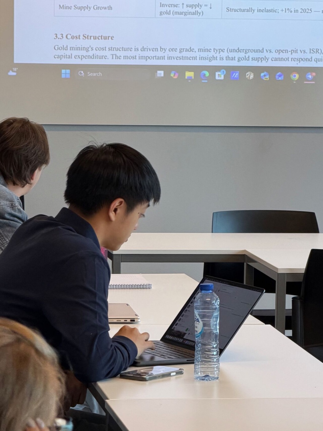 Analysts following a report during a session